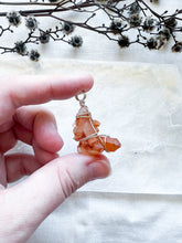 Load image into Gallery viewer, Silver wrapped Tangerine Quartz pendant
